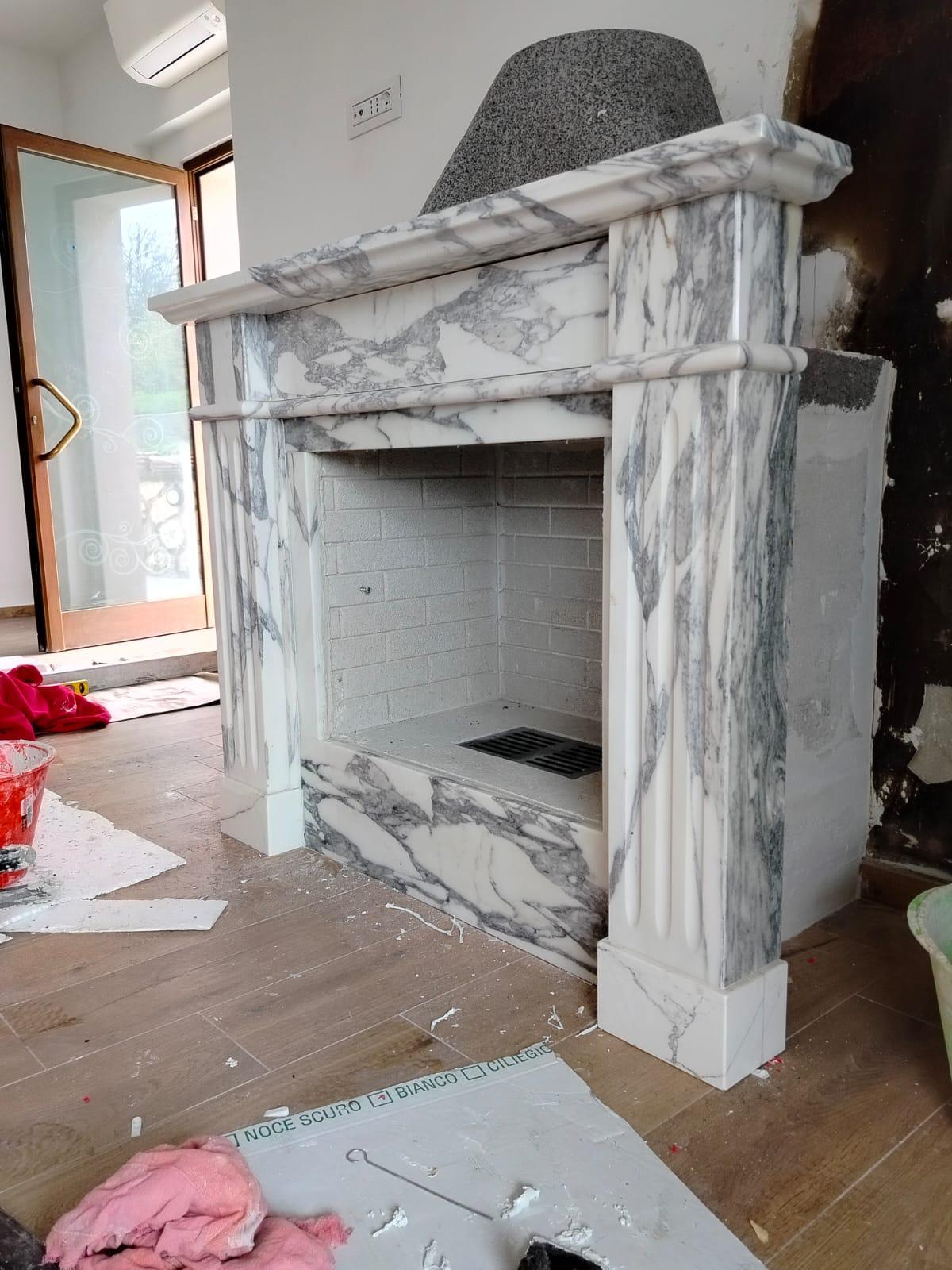 Classic Arabescato marble fireplace with fluted columns
