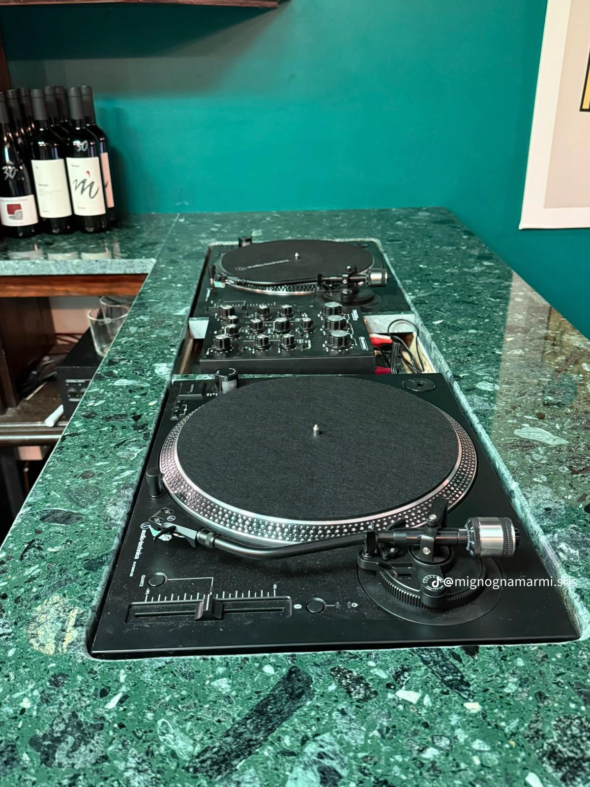 DJ console clad in Verde Alpi