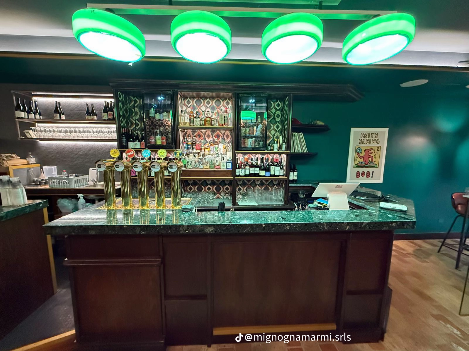 Bar counter in Verde Alpi marble