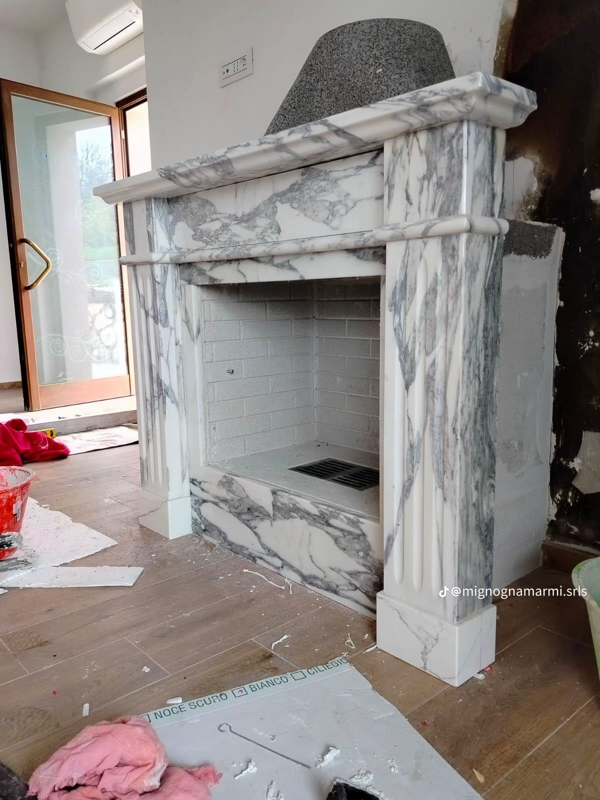 Classic fireplace with sculpted columns