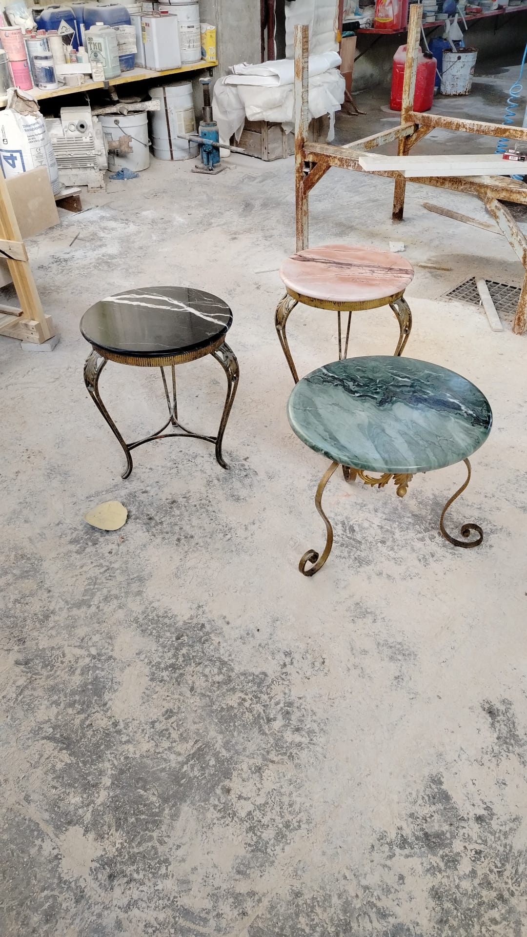 Trio of side tables in black, pink and green marble
